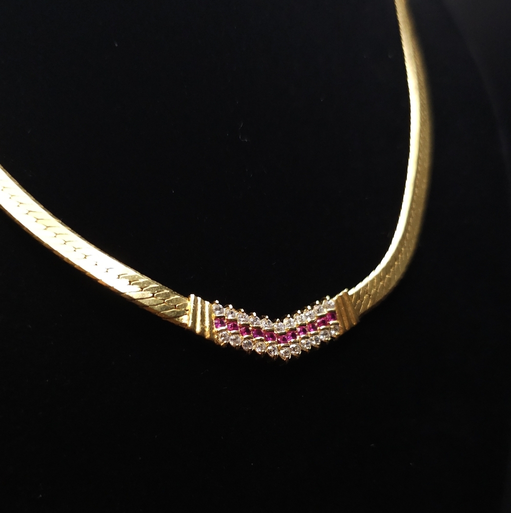 Gold plated diamond & ruby crystal necklace.